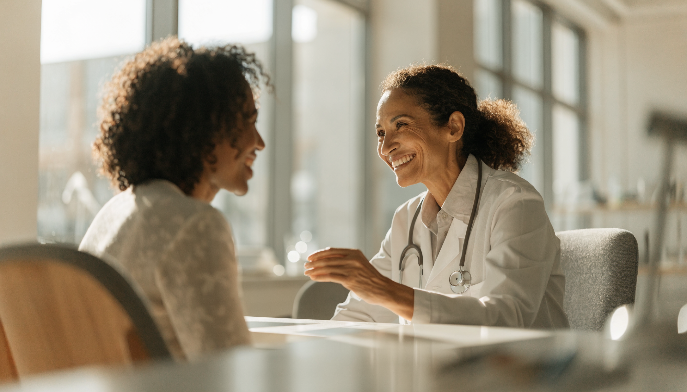 Clinician consulting a patient